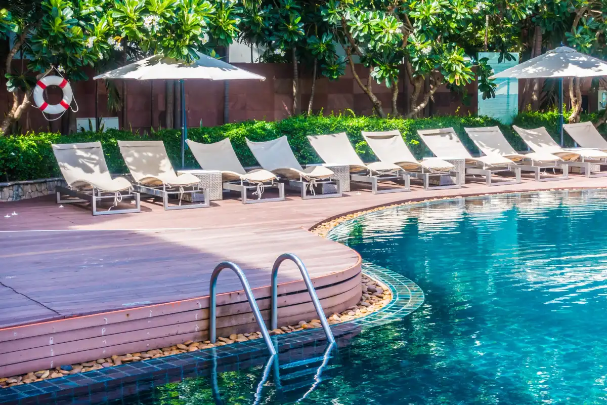 Outdoor swimming pool cleaning and maintenance